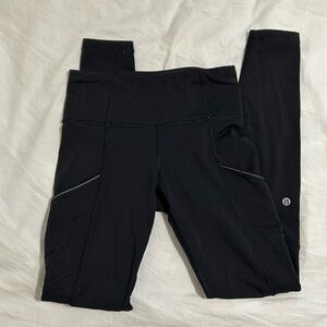 Lululemon black leggings. Size 4 with pockets.